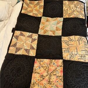 Patchwork Quilt with Black Accents